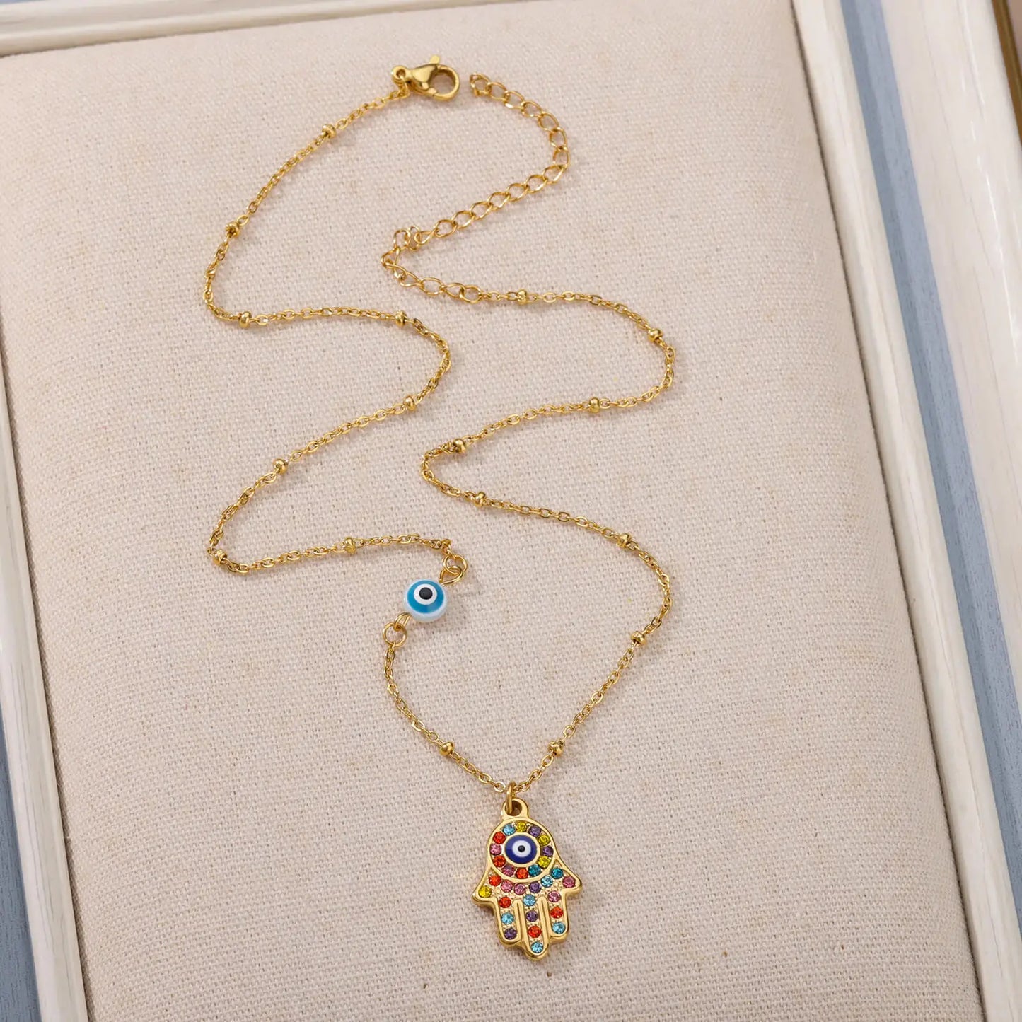 Colar Olho Grego Hamsa Dourado em Aço Inoxidável